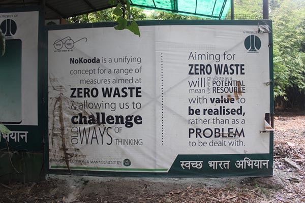 A sign that says "NoKooda is a unifying concept for a range of measures aimed at zero waste & allowing us to challenge old ways of thinking. Aiming for zero waste will mean viewing waste as a potential resource with value to be realised, rather than a problem to be dealt with."