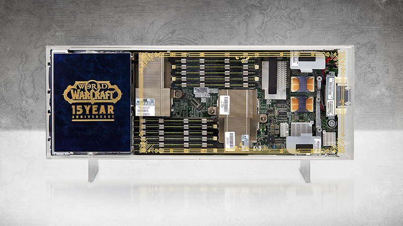 Photograph of a server blade with a border, the World of Warcraft logo, and the words "15 year anniversary" painted in gold.