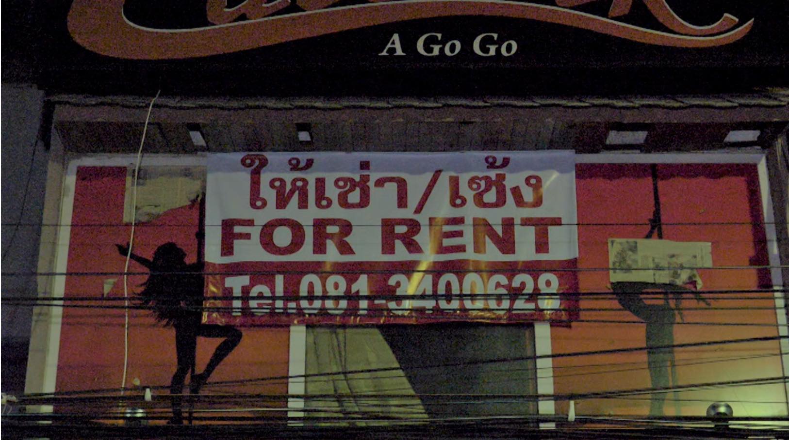 A go-go bar on Walking Street in Pattaya with a sign reading “For Rent”. Many bars and nightlife venues have been transformed into makeshift housing. Photo Credit: Sky News.