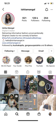 ID: Screenshot of an Instagram Profile of creator named Ishita Mangal with tile of pictures of her collaborations beneath a description of her interests. 