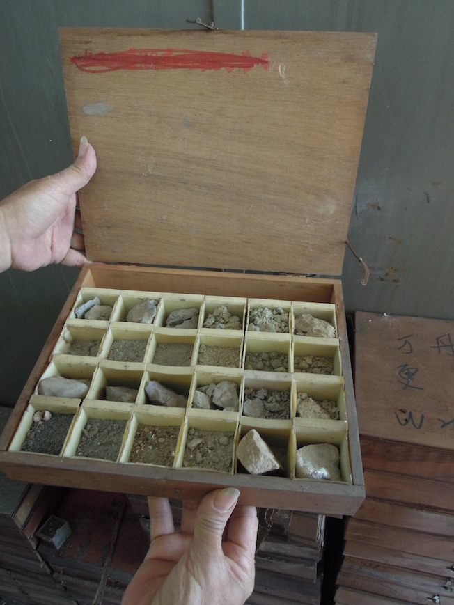 A box containing different samples obtained by cutting.