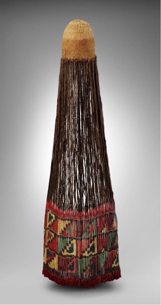The image shows the elaborate investments made in hair that are laden with social meanings 