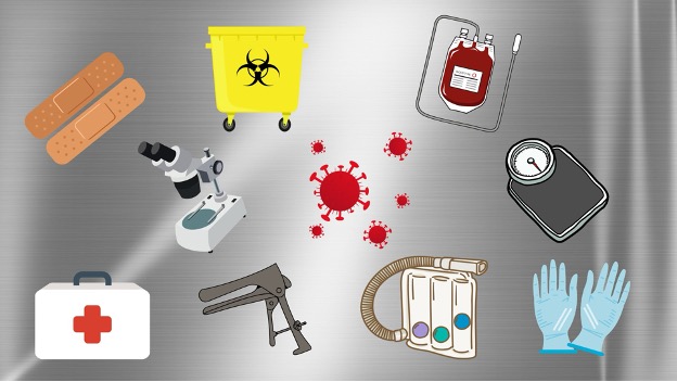 Collection of medical objects spread across a stainless steel surgical instrument table surface. Objects are differently angled and positioned against the sterile backdrop.