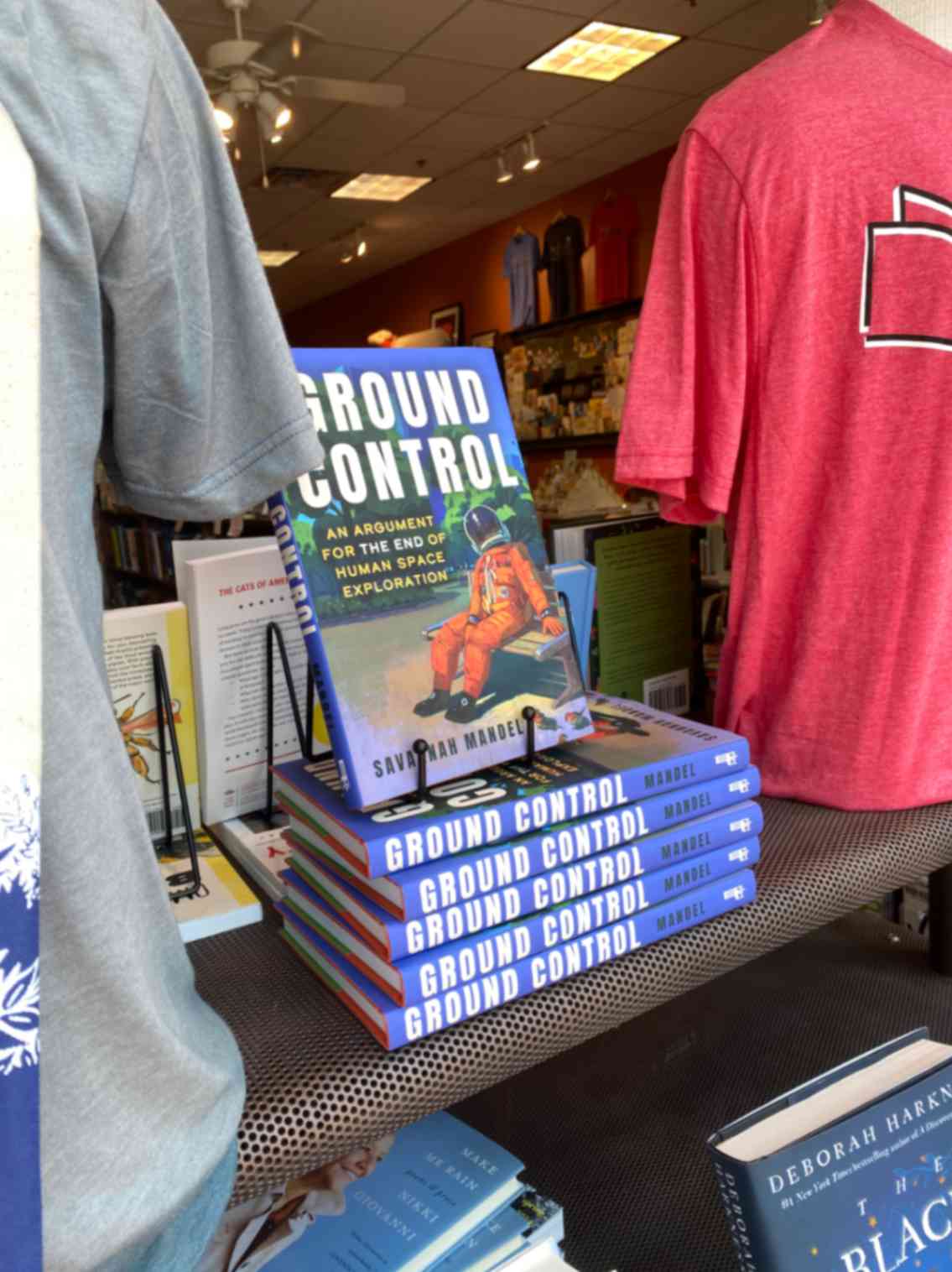 Closeup shot of books with the title "Ground Control" in a bookshop window. 