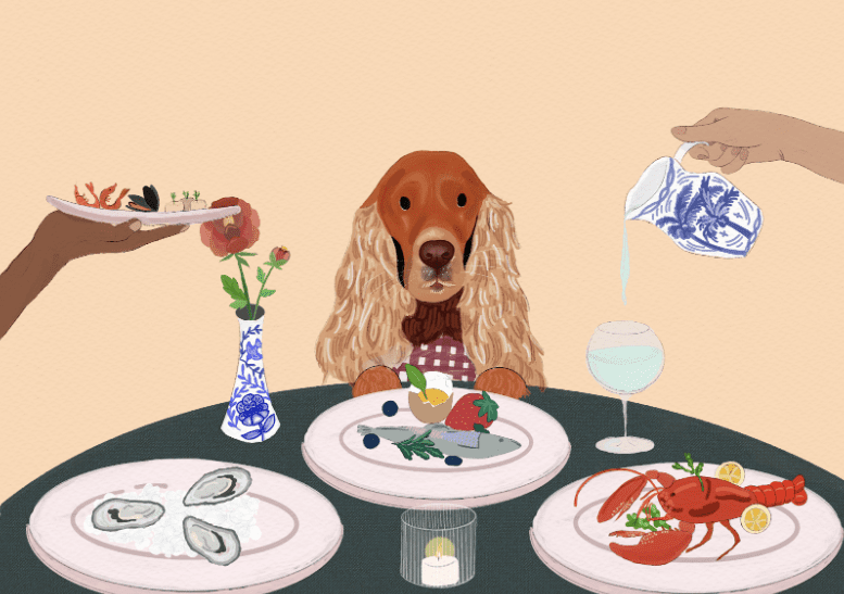 A tan-coloured cocker spaniel sits at a fine dining table with three plates, one with three oysters, one with a whole lobster, and one with a fish, strawberry, and raw egg. Two hands serve the dog, one with a plate of prawns, mussels, and scallops, and the other, water. There is also a tea light and a delft pottery vase with peonies on the table for decorative purposes