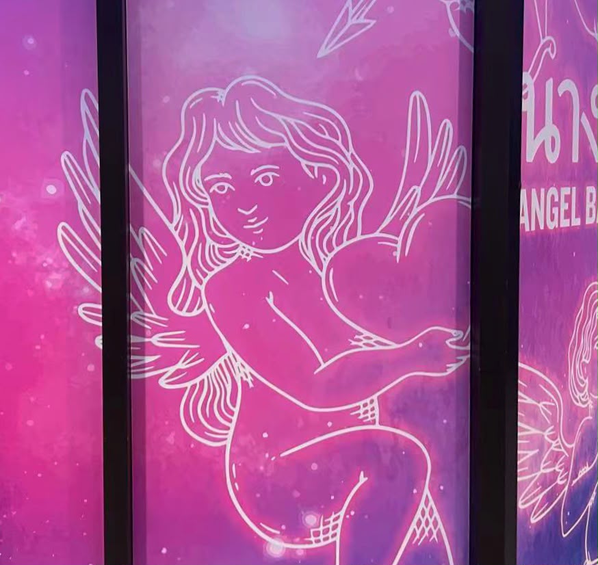 A white line drawing of a winged, long-haired woman against a vibrant pink and purple background, framed by black vertical window bars. Partial white lettering and decorative illustrations appear on the surrounding panels.