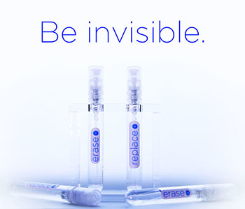 Photograph of clear vials labeled "erase" and "replace" it says "Be invisible" above them.