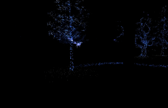 An animated image. A black background with dark blue dots forming barely visible trees and plants. Something flies by leaving a trail of blue light behind it.